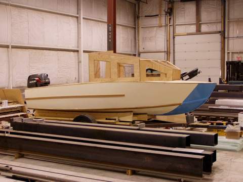 Starboard view of cabin frame and outboard motor